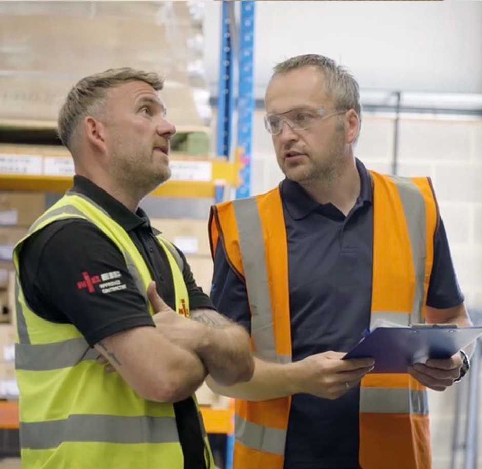 Chris Thompson - Managing Director at CTE Electrical Contractors - discussing a new energy saving project in Barnsley with a commercial client.