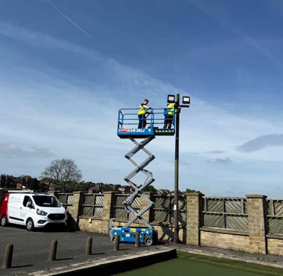 Sports Club LED Lighting Upgrade by the CTE expert team. Using a scissor lift a safe and effective energy saving lighting solution was installed at the Sheffield sports ground.